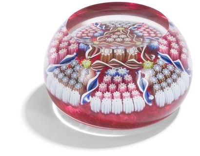 null Perthshire 
Paperweight signed P, with a translucent red background decorated...