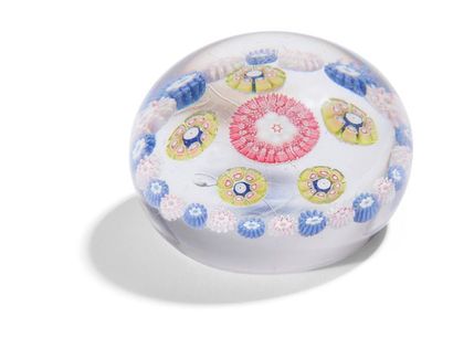 null Saint-LouisPress paperweight
with a wreath design of alternating white and pink...