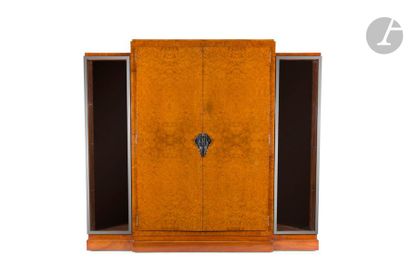 null WORK OF THE 1925/30's
 Library
 furniture
 forming a showcase in Amboine burr...
