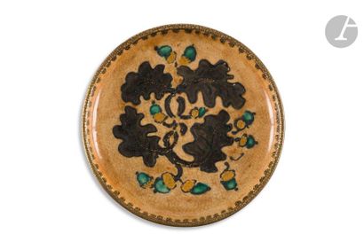 null ANDRÉ METTHEY (1871-1920) 
Feuilles de chêne et glands, saison 2
Assiette décorative...