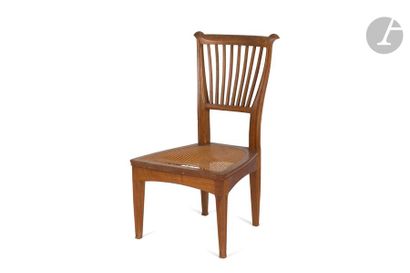 null TONY SELMERSHEIM (1871-1971
)Low chair in stained ash wood, moulded and carved....