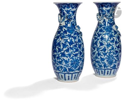 null CHINA - XIXth centuryPair of
blue enamelled porcelain vases underglaze with...
