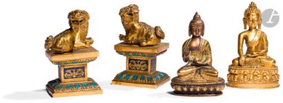 null CHINEEA set in
gilt bronze of two statuettes of Buddha, one making the gesture...