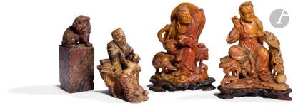 null CHINE - XXe siècle
Ensemble comprenant quatre statuettes en stéatite sculptée...