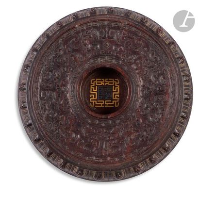 null CHINESocle in the
shape of a bi-disc, the rim forming a lotus, made of wood...