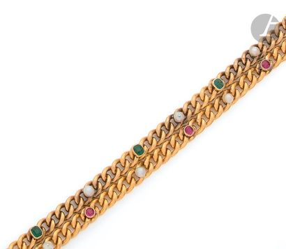 null Bracelet of two 18K (750) gold chains, each one engraved with an emerald, a...
