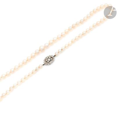 null Falling cultured pearl necklace, platinum clasp set with old cut diamonds. French...