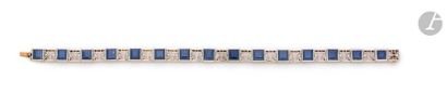 null Platinium and 18K (750) gold bracelet, articulated with square sapphires alternating...