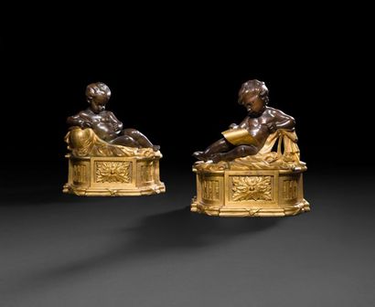 null Pair of gilded and patinated bronze children's candlesticks decorated with allegorical...