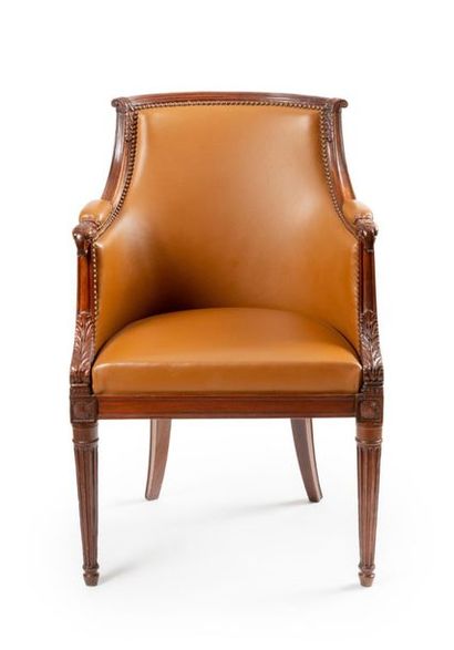 null Solid mahogany armchair, molded and carved, with a curved backrest with overturning,...