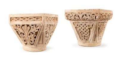 null Pair of limestone capitals carved on all sides in depth; flared baskets with...