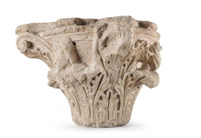 null Carved limestone capital with acanthus leaf decoration and busts of a man and...