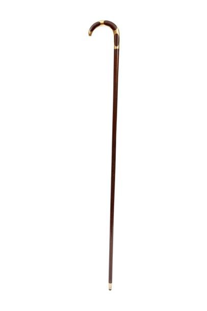 null Snakewood cane complete with its ferrule, enhanced on the handle with a gold...