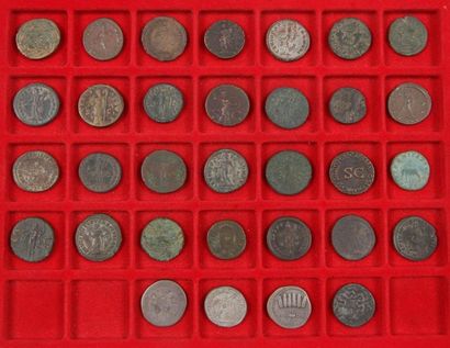 null 32 monnaies romaines :

- 15 moyens bronzes du Ier au IIIe siècle (Agrippa,...