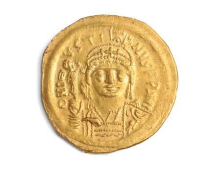 null JUSTIN II (565 - 578). Solidus. Constantinople. 4.27 g

His bust is helmet-faced....