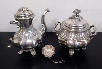 null A quadripod silver teapot and sugar bowl with rockery and shell decoration,...