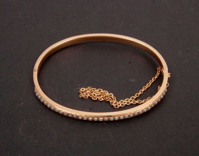 null Bracelet d'enfant rigide en or (18 K) et perlettes. Poids brut : 5.6 g