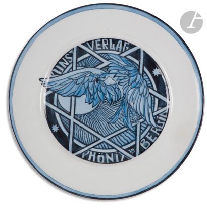 Blue enameled porcelain plate with stylized...