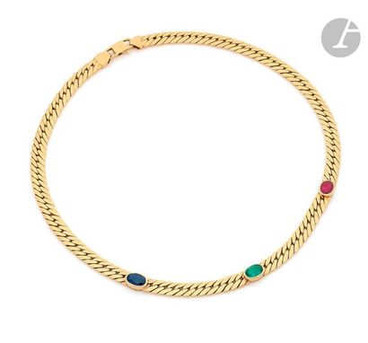 null Necklace in 18K (750) gold, flat mesh, adorned with a sapphire, an emerald and...