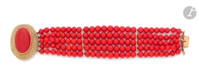 null Bracelet of 5 rows of coral beads, 18K (750) and 14K (585) gold plaited clasp...