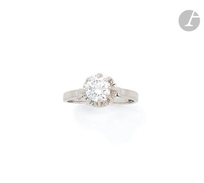 null 18K (750) white gold ring set with a round brilliant cut diamond weighing 1.11...