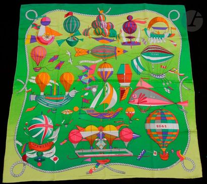 null HERMÈS square, "Les folies du ciel", green background, yellow border. Signed...