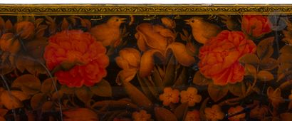 null 
A lacquered papier-mâché qalamdan pencil box with gul-o bulbul decoration,...