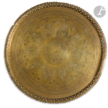 null Set of four copper alloy trays with engraved decoration, Near East and North...