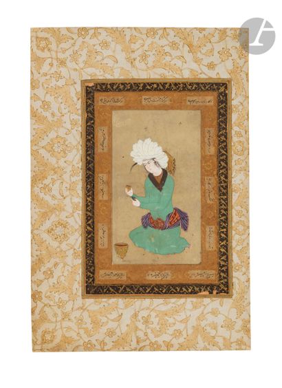  Kneeling young man with a cup and fruit, Safavid Iran, Esfahan, mid-17th centuryWash...