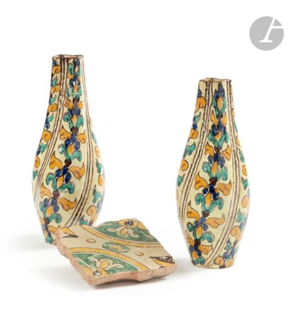  Pair of earthenware vases, Tunisia, Nabeul, circa 1920From a tapered shape with...