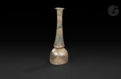  Balsamaire With spherical body and high neck pinched at the base. Roman period,...