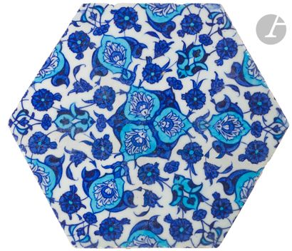 Hexagonal tile with blue and white decoration,...
