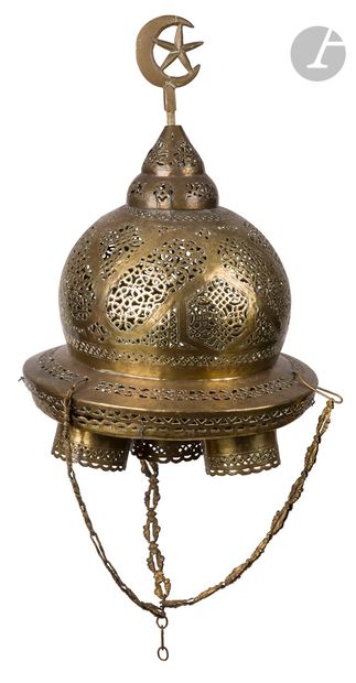  Mosque lamp, Near East or Egypt, early 20th centuryBulbous dome in chased brass...