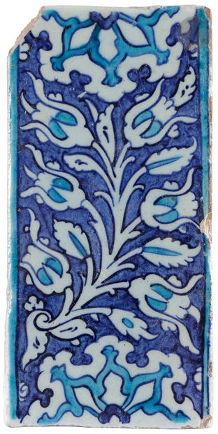  Set of five border tiles decorated with floral stems and rosettes, Ottoman Empire,...