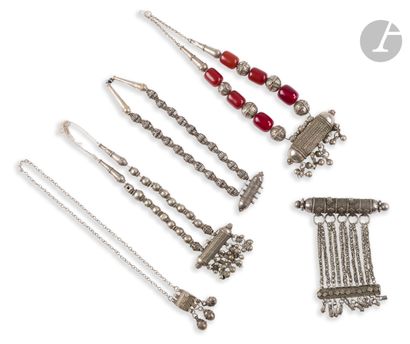 null Set of five talismanic jewels, Yemen, 20th centuryA
silver-plated hirz pendant...