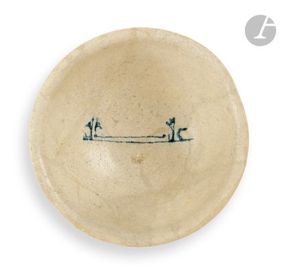  Earthenware bowl with blue inscription decoration, Abbasid Iran or Iraq, 9th centuryEarthenware...