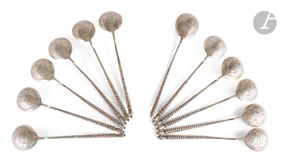  12 tea spoons. 1875Russian model , with twisted stem. The inside of the spoon is...