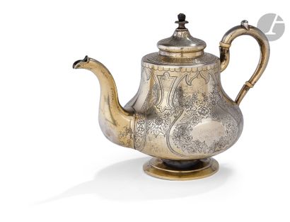 Silver baluster teapot. 1880The body engraved...