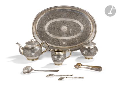  Pavel Akimovich OVTCHINNIKOV (1830-1888 )A silver tea set with engraved and nielloed...