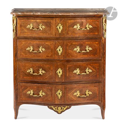 null A rosewood and amaranth chest of drawers, with four drawers, the royal red marble...