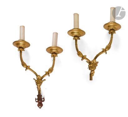 null Two ormolu two-light sconces with foliage decoration; (pierced for electricity;...