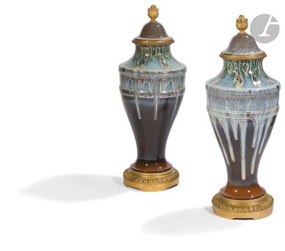 null Pair of baluster vases, covered in polychrome enamelled porcelain with drips,...