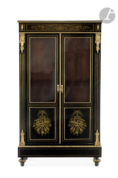 null Blackened wood and engraved brass marquetry bookcase, opening with two glass...