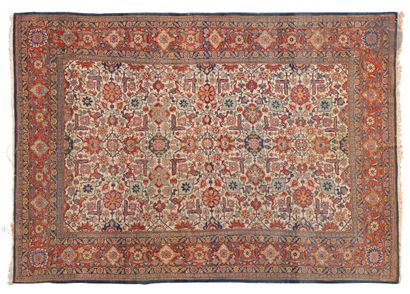 null KESHAN - 19th centuryCarpet
with stylized flowers on an ivory background, large...