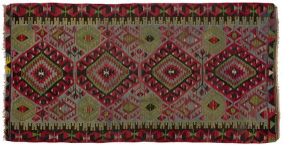 null KILIM.
Carpet decorated with four large crenellated motifs on a blue background,...