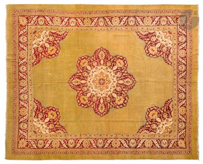 null AGRA
Carpet decorated with a large ruby medallion on a mustard background, four...