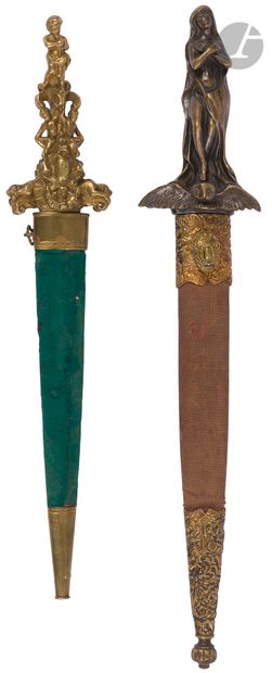 null Two daggers of style
:- One with a handle decorated with a woman and owl.
-...