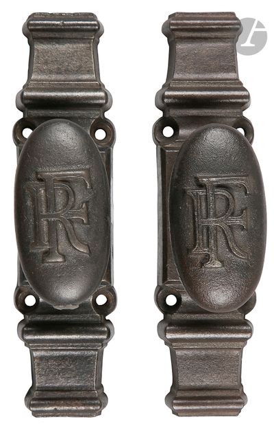 null French Republic.
Two oval cast-iron window credenza handles with the number...
