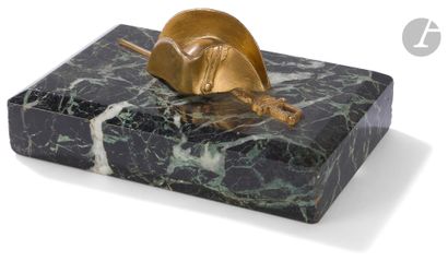 null Remembering the Emperor.
Green marble paperweight decorated with the sword and...