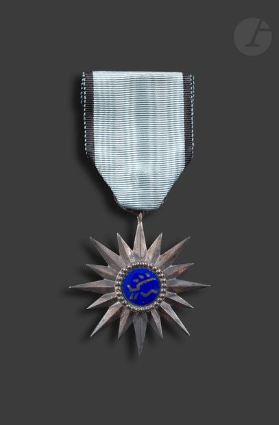 null FEDERATION TAI 
ORDER OF MILITARY MERIT Star
in silver bronze and enamel. Ribbon...